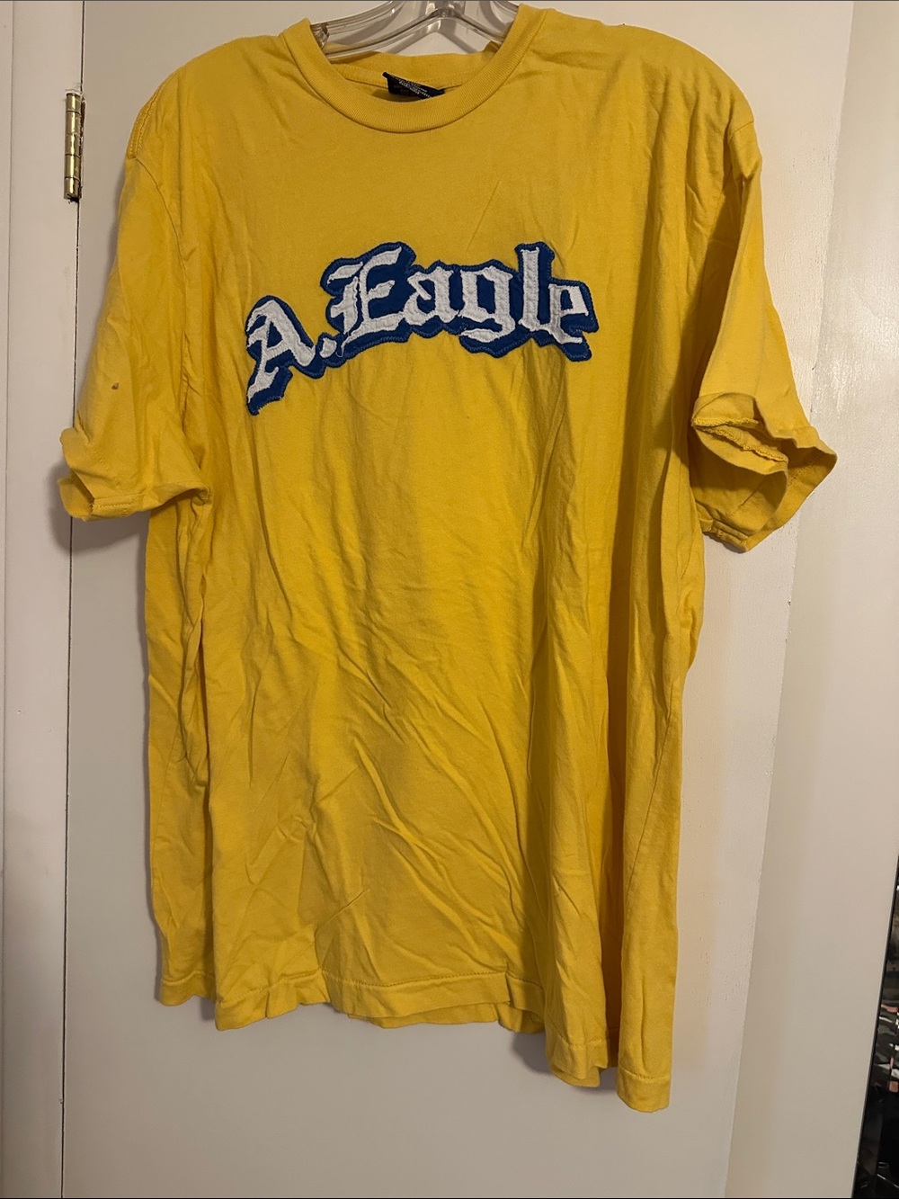 American Eagle Outfitters Yellow Tee with Blue Script Logo
